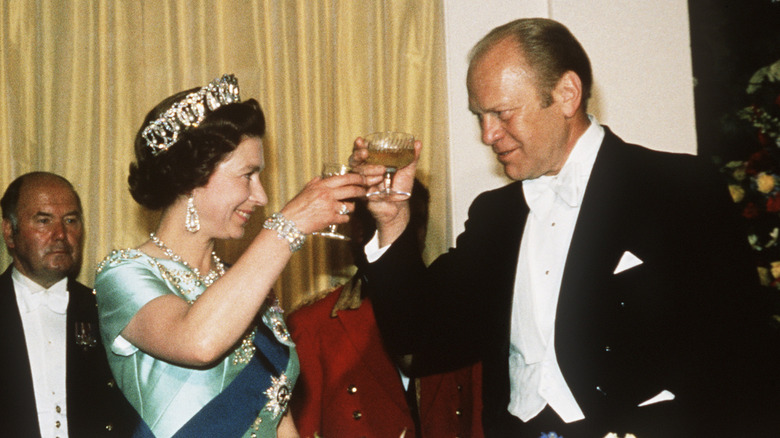 Queen Elizabeth and Gerald Ford, both giving a toast