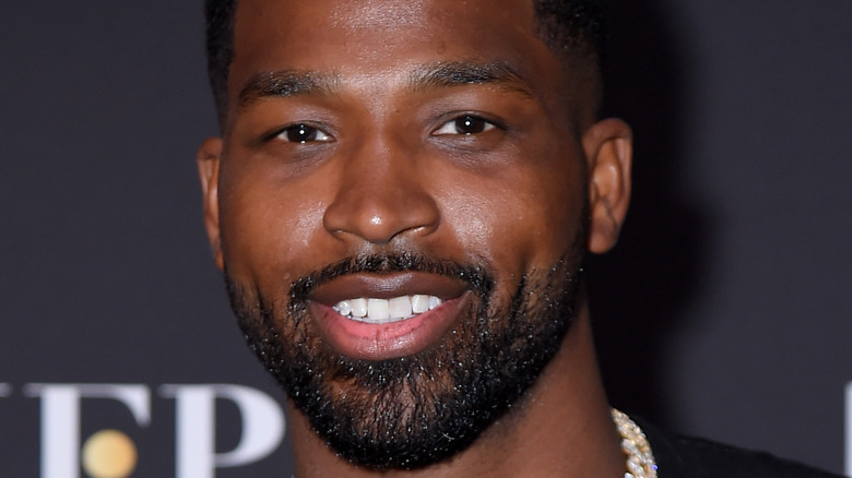 Tristan Thompson smiling on the red carpet