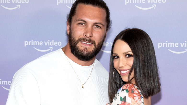 Brock Davies and Scheana Shay posing together