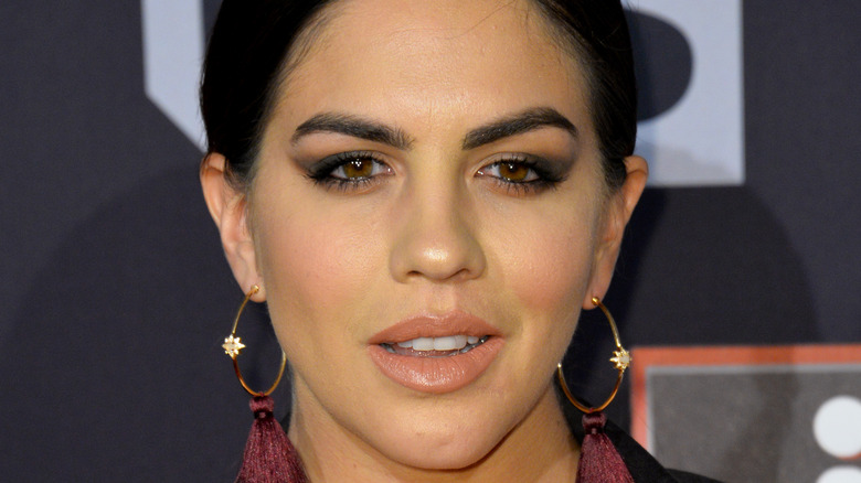 Katie Maloney posing red carpet