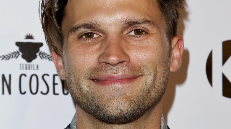 Tom Schwartz smiling on red carpet