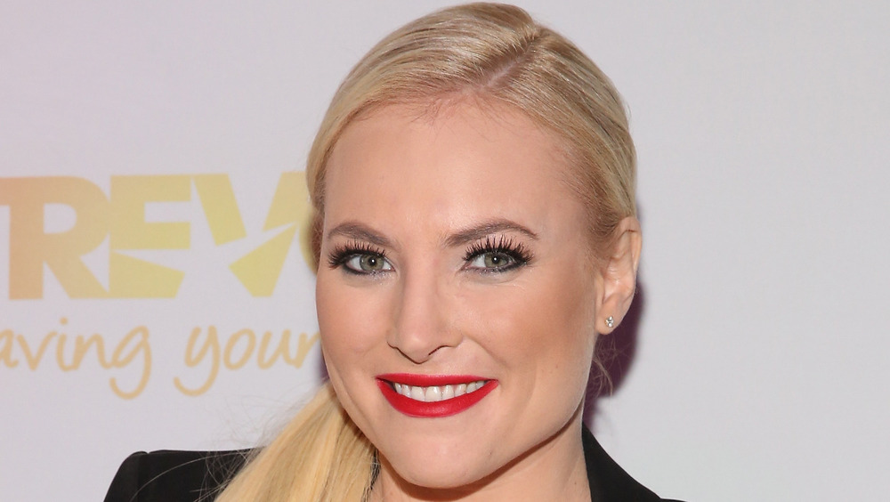 Meghan McCain smiling and posing