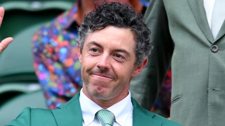 Rory McIlroy waving at Wimbledon.