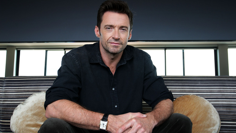 Hugh Jackman sitting down