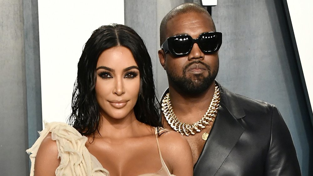 Kim Kardashian West and Kanye West attending the 2020 Vanity Fair Oscar Party