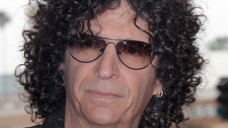 Howard Stern wearing earrings