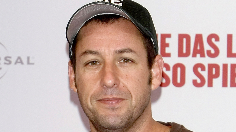Adam Sandler posing for cameras