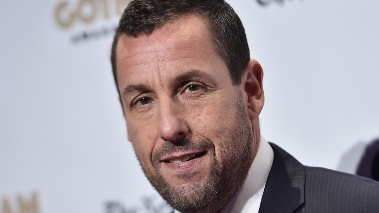 Adam Sandler posing for cameras