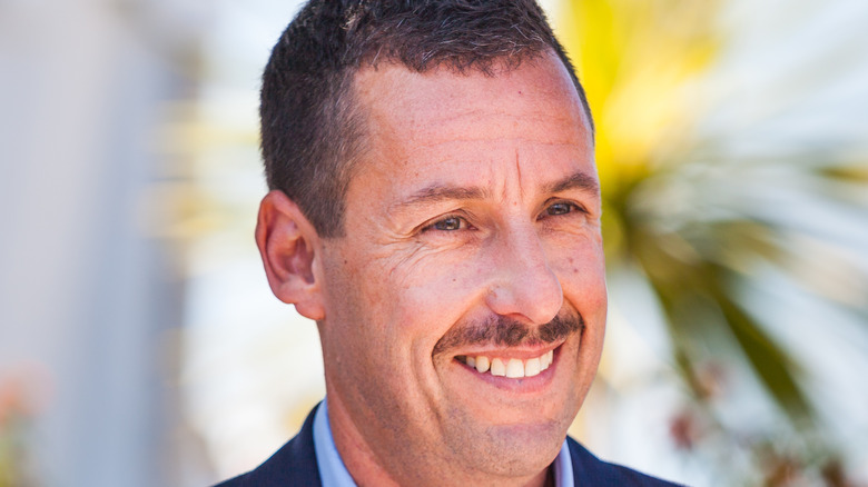 Adam Sandler posing for cameras