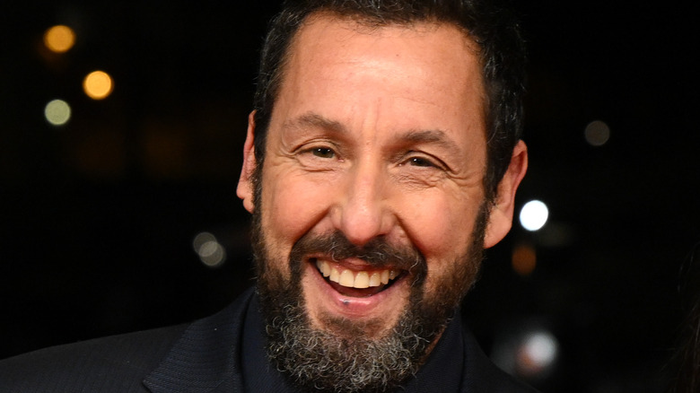 Adam Sandler posing for cameras