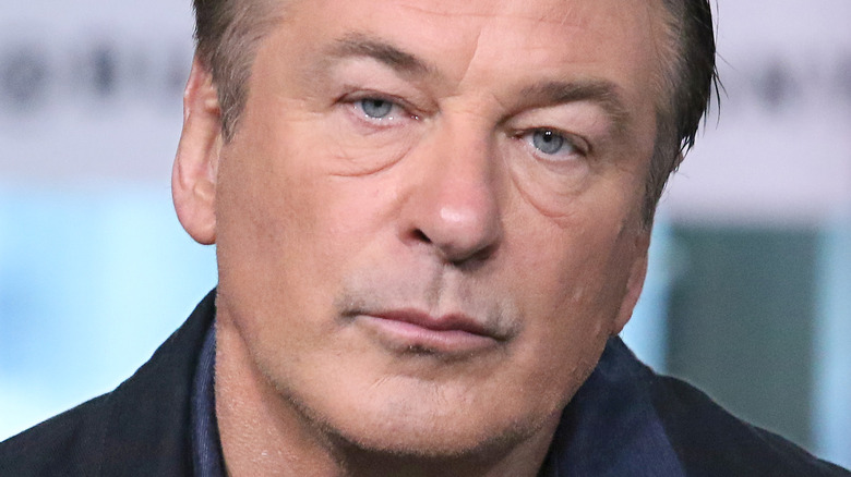 Alec Baldwin with a neutral expression