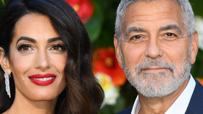 Amal Clooney and George Clooney smiling