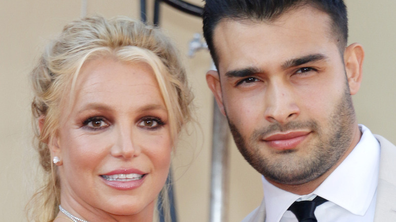 Britney Spears posing with Sam Asghari