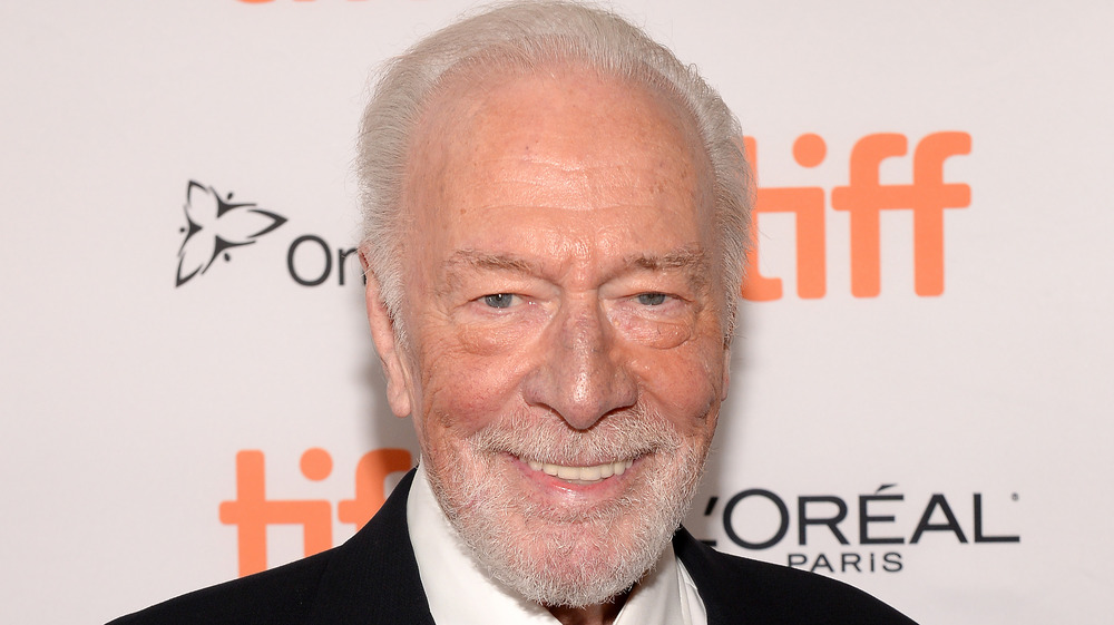 Christopher Plummer smiling on red carpet