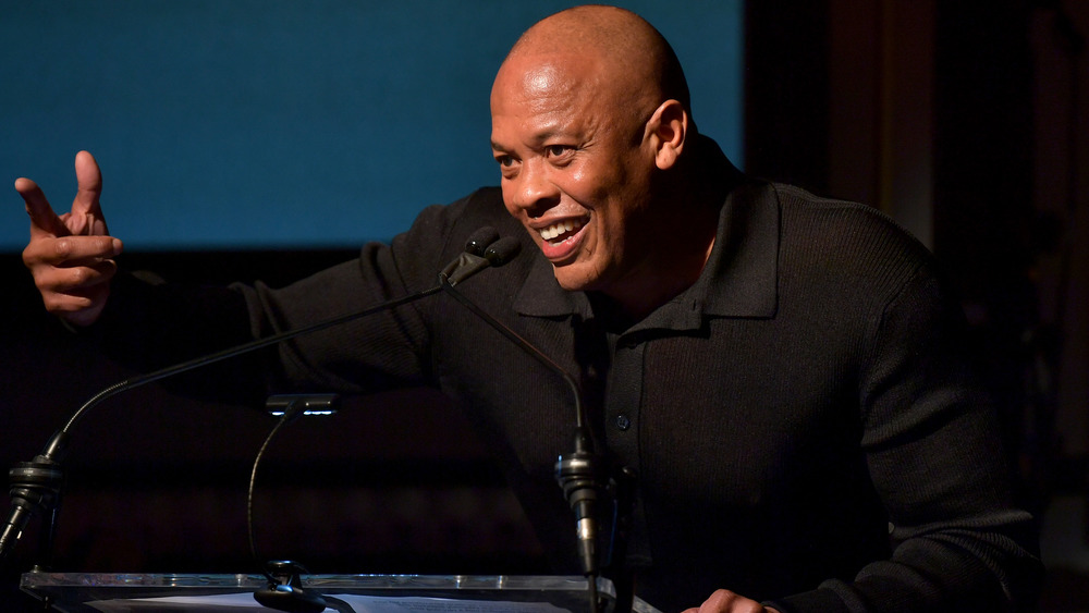 Dr. Dre pointing on stage