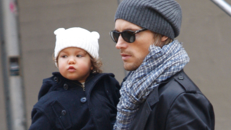 Gabriel Aubry walks with Nahla Aubry in 2009
