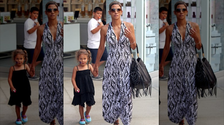Halle Berry and Nahla Aubry walking in 2011.