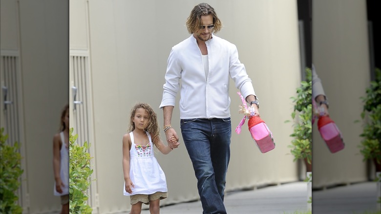 Gabriel Aubry walks with Nahla in 2013.