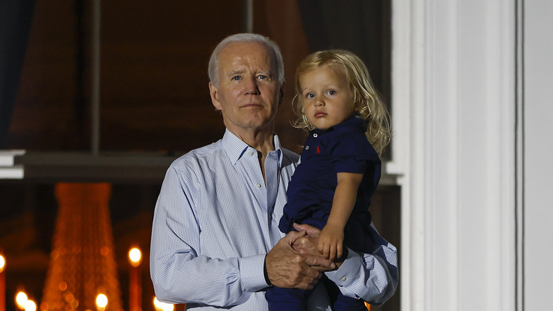 Joe Biden holding Beau Biden Jr