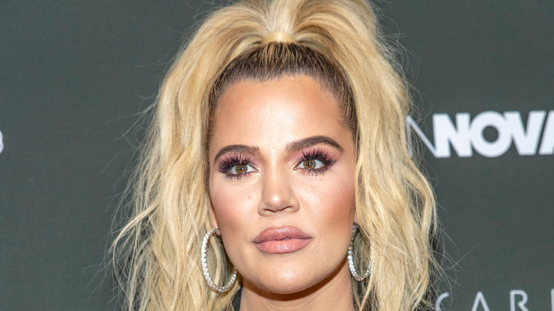 Khloé Kardashian staring off