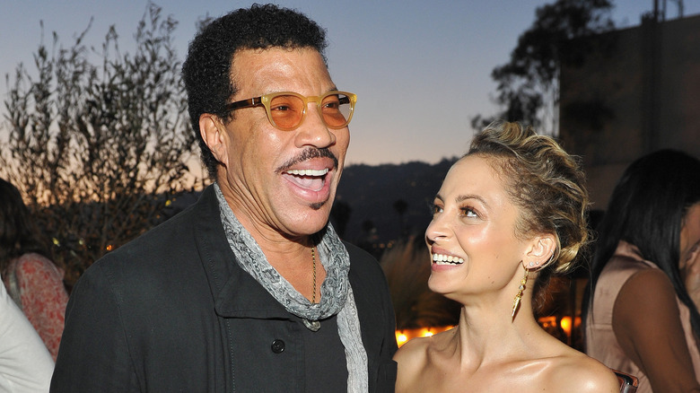 Lionel and Nicole Richie smiling