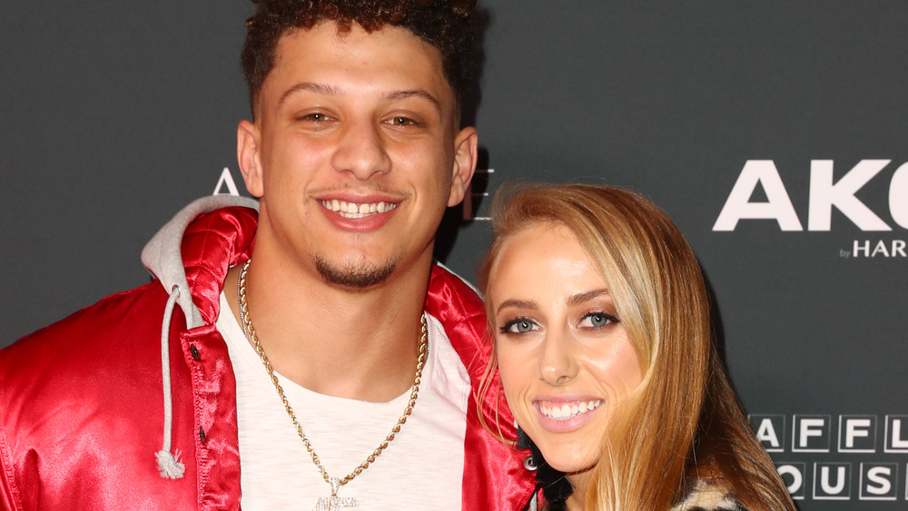  Brittany Matthews and Patrick Mahomes posing together