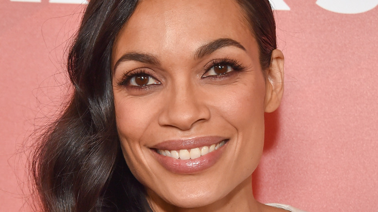 Rosario Dawson with hair to the side