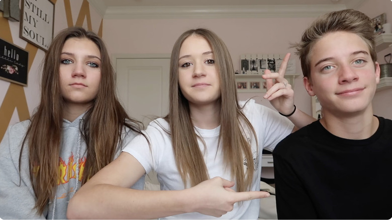 The Lewis triplets together