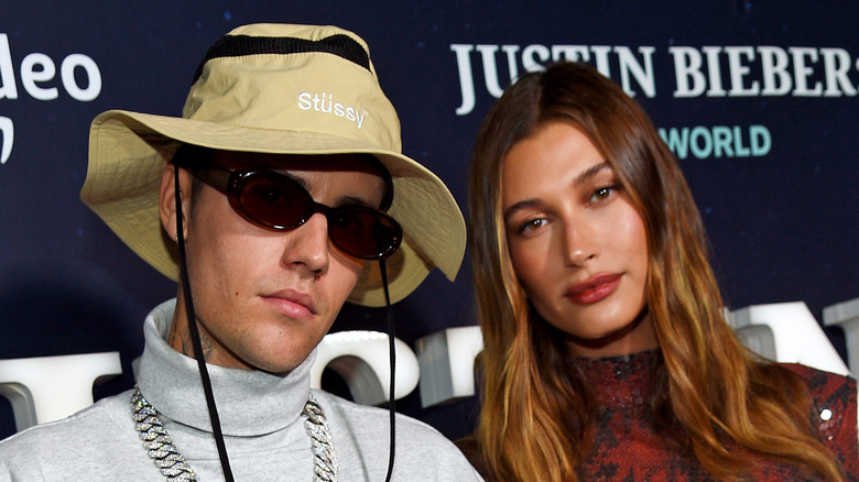 Justin and Hailey Bieber posing