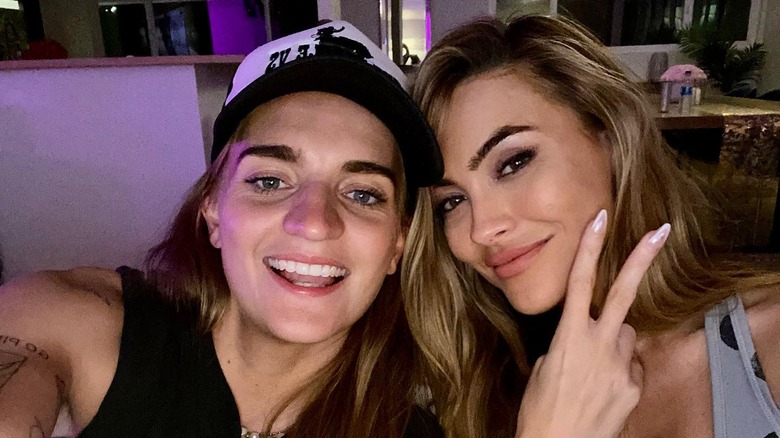G-Flip and Chrishell Stause smiling