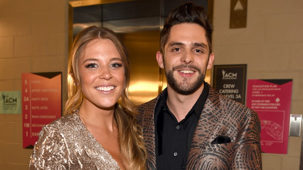 Thomas Rhett and Lauren Akins smiling together