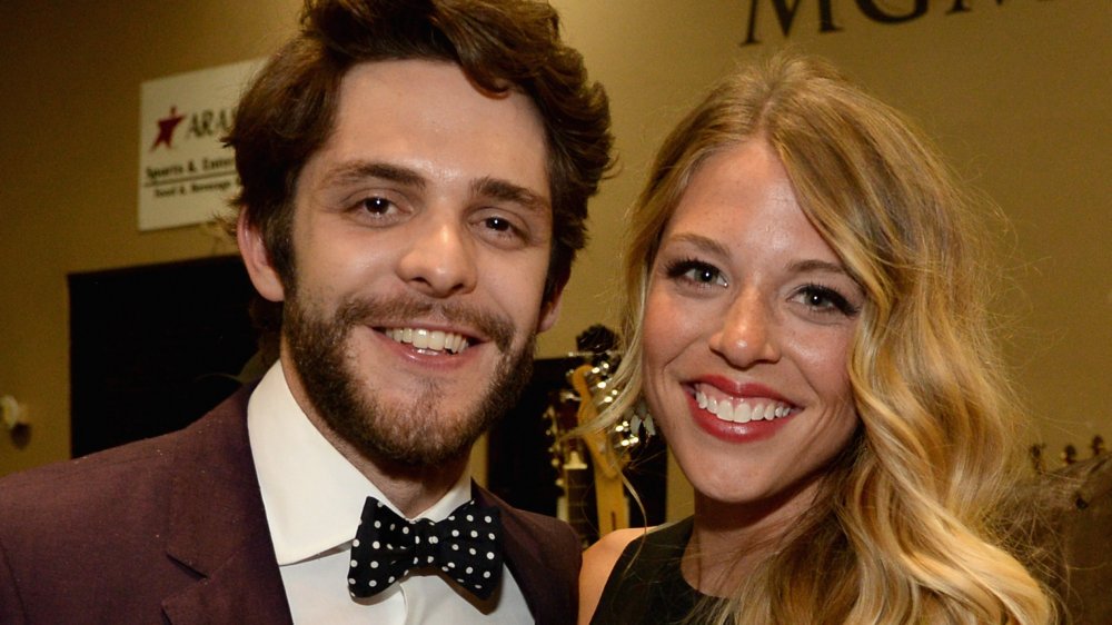 Thomas Rhett with a black bow tie and Lauren Akins