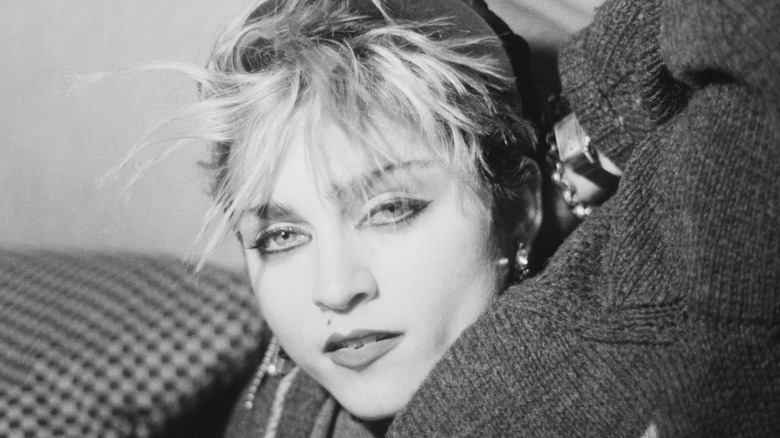 Madonna posing with spiky bangs
