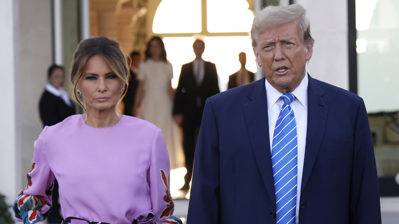 Melania Trump scowling as Donald Trump speaks