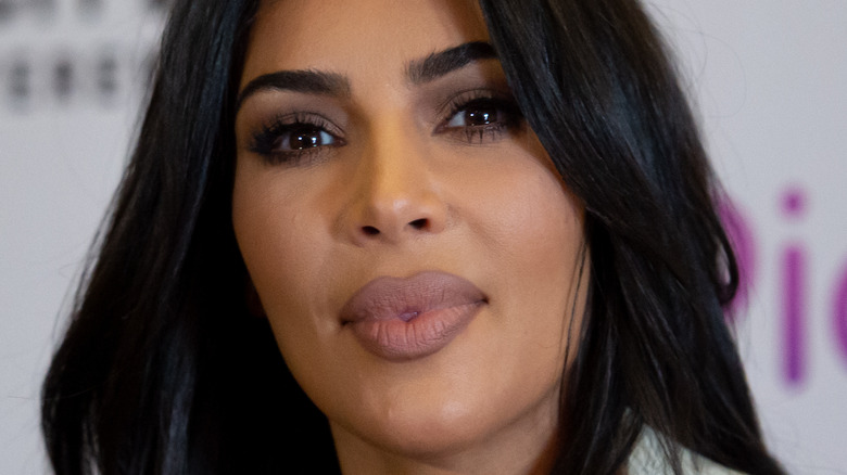 Kim Kardashian lips pressed together
