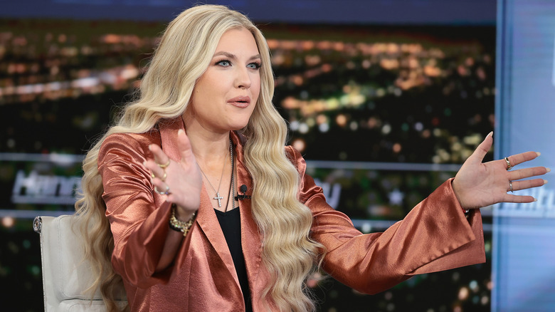 Erika Kirk speaking animatedly on 