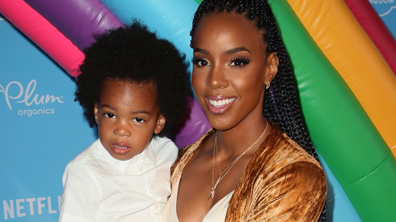 Kelly Rowland poses with son