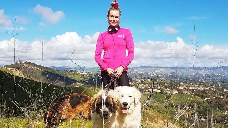 Rebecca Romijn and three dogs