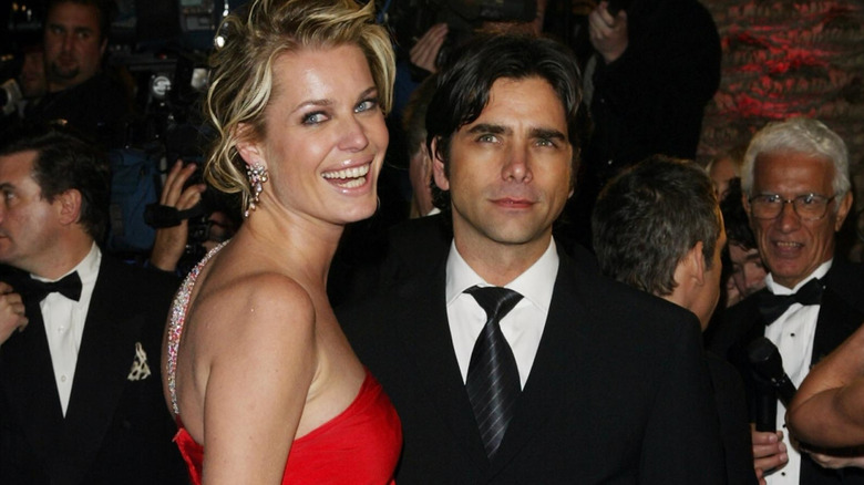 Rebecca Romijn and John Stamos