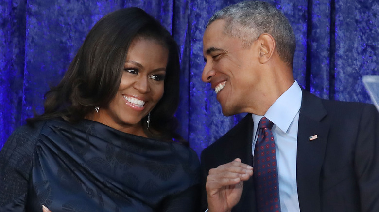 Michelle and Barack Obama smiling 