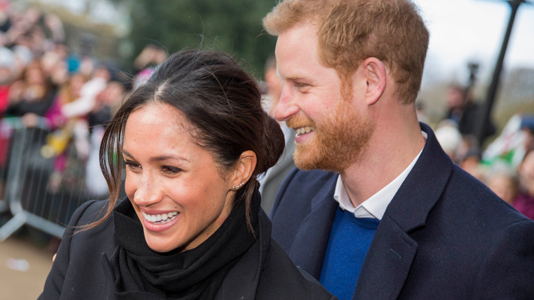 Harry and Meghan smile