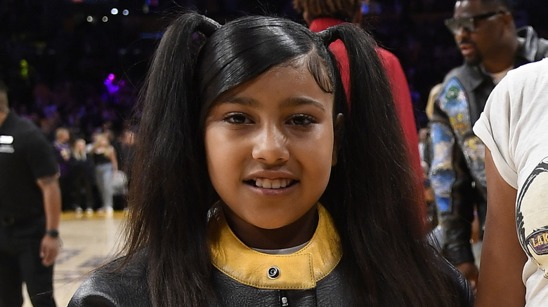 North West smiling in pig tails