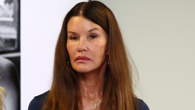 Janice Dickinson wearing straight hair