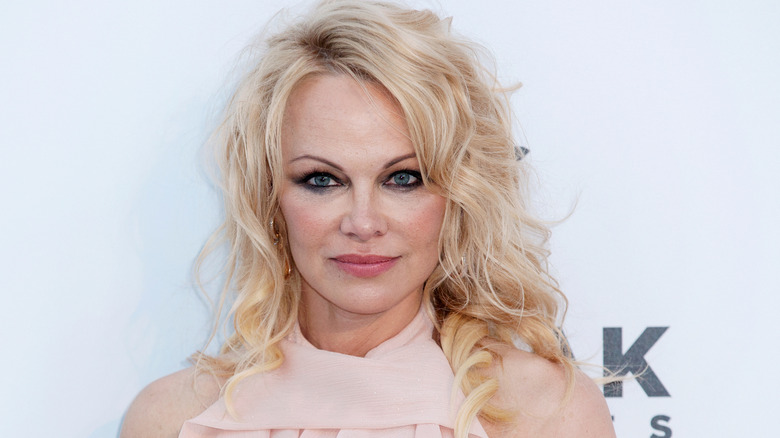 Pamela Anderson posing for cameras
