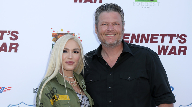Gwen Stefani and Blake Shelton smile 