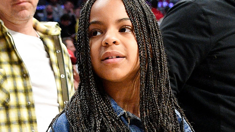 Blue Ivy Carter, wearing long braids 