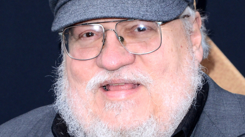 George R.R. Martin in a grey cap