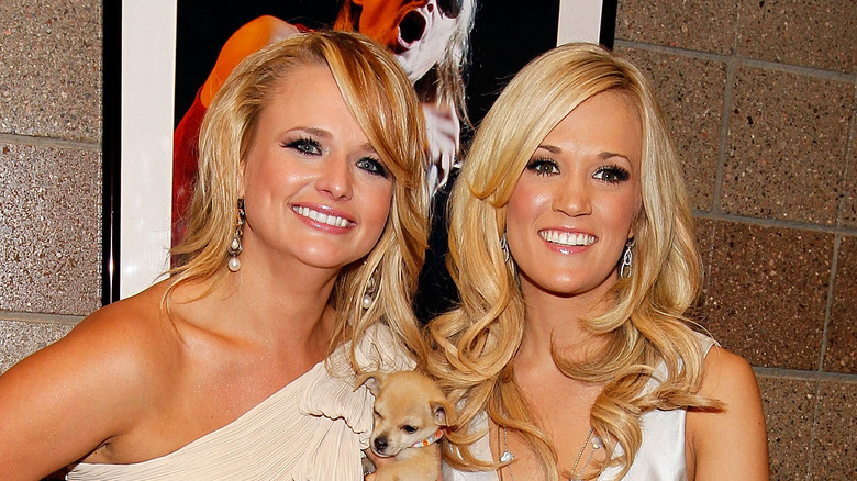 Miranda Lambert and Carrie Underwood smiling