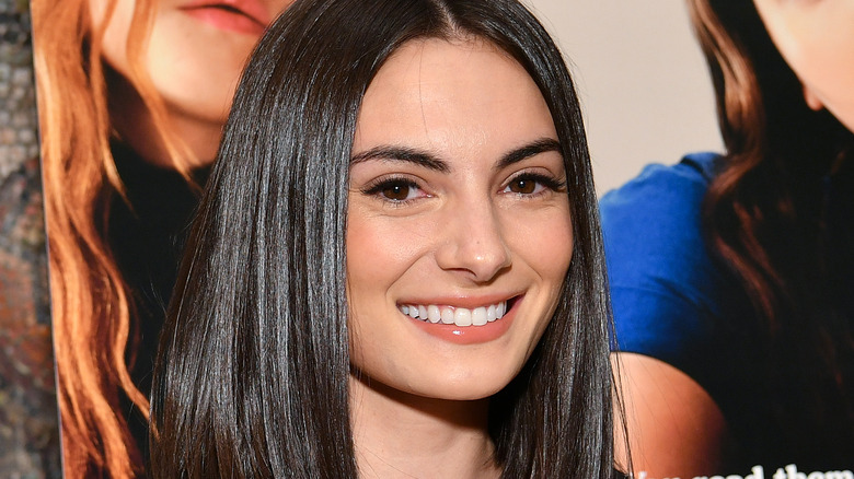 Paige DeSorbo smiles center part eyebrows