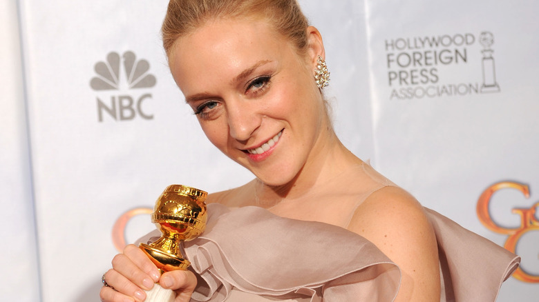 Chloe Sevigny posing with Golden Globe
